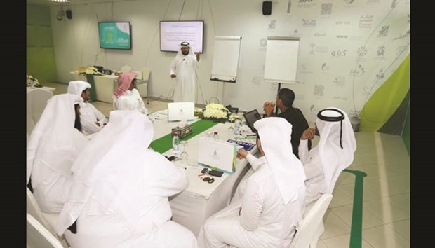 Participants listen to a resource speaker during the life skills development project, Sekkak.