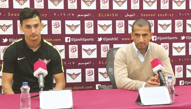 Al Jaish coach Sabri Lamouchi (right) and winger Sardor Rashidov.