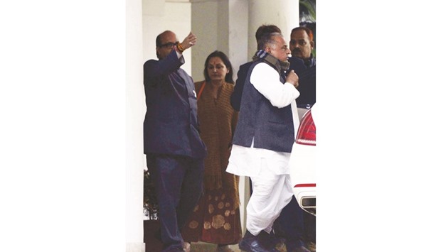 Samajwadi Party chief Mulayam Singh Yadav arrives at the office of the Election Commission in New Delhi yesterday. Also seen are Amar Singh and Jaya Prada.
