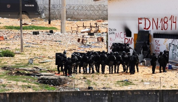 Riot policemen are seen during an uprising at Alcacuz prison in Natal
