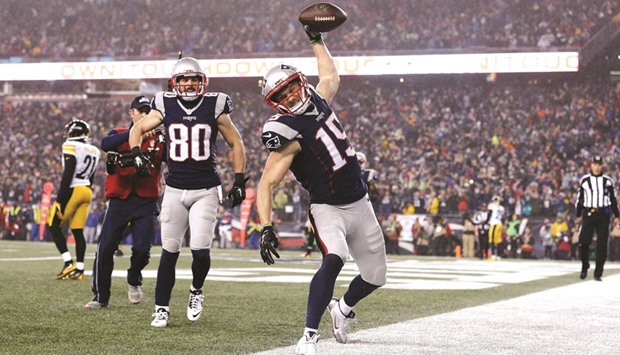 Chris Hogan (right) of the New England Patriots celebrates after scoring a touchdown in the AFC Championship Game against the Pittsburgh Steelers at Gillette Stadium in Foxboro, Massachusetts, on Sunday. (AFP)