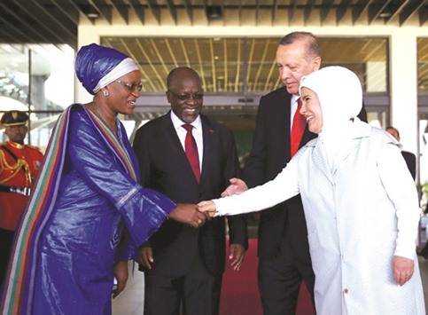 Turkish President Recep Tayyip Erdogan and his wife Emine Erdogan are welcomed by Tanzanian President  John Pombe Joseph Magufuli and his wife Janet Magufuli during an official ceremony in Dar es Salaam.