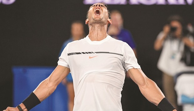Spainu2019s Rafael Nadal celebrates his victory against Franceu2019s Gael Monfils during their menu2019s singles fourth round match yesterday at the Australian Open.