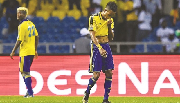 Gabonu2019s star forward Pierre-Emerick Aubameyang cuts a lonely figure after the hosts crashed out of the 2017 Africa Cup of Nations following their draw against Cameroon in the Group A match at the Stade de lu2019Amitie Sino-Gabonaise in Libreville on Sunday. (AFP)