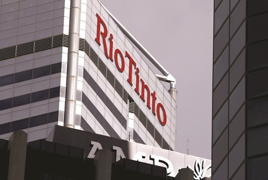 A sign adorns the building where Rio Tinto has their office in Perth, Western Australia. The mining company agreed to sell its Australian unit Coal & Allied Industries to Chinese government-controlled Yancoal Australia, sources said yesterday.