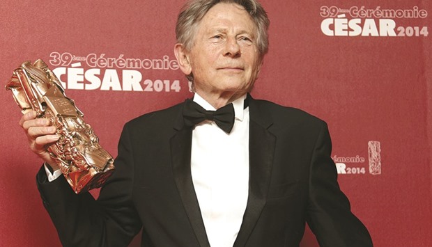 This 2014 file picture shows Polanski with his Best Director award for La Venus A La Fourrure (Venus in Fur) during a photocall at the 39th Cesar Awards ceremony in Paris.