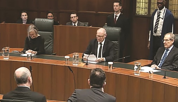 A grab taken from the televised live feed shows the President of the Supreme Court David Neuberger (centre) as he delivers judgement in case to decide whether or not parliamentary approval is needed before the government can begin Brexit negotiations, inside the Supreme Court in central London yesterday.