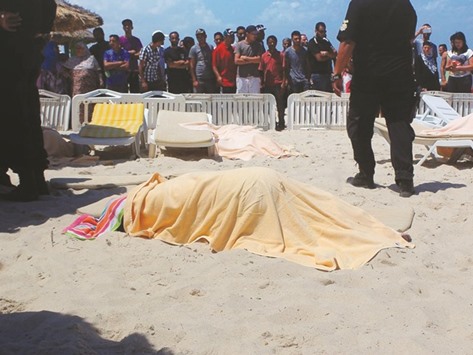 The bodies of people are seen after an armed attack on a tourist hotel in Sousse, Tunisia.