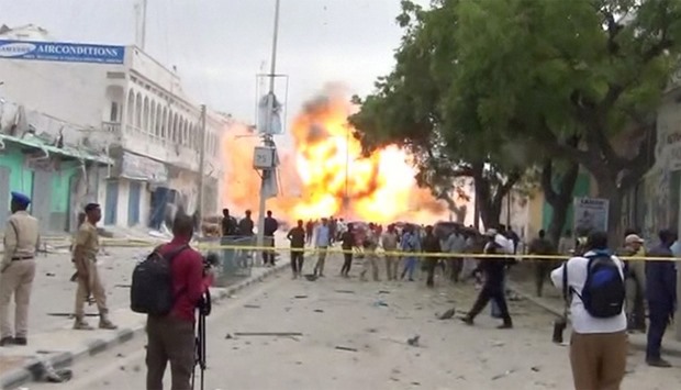 Explosion after a suspected suicide car bomb rammed into the gates of a hotel in Mogadishu
