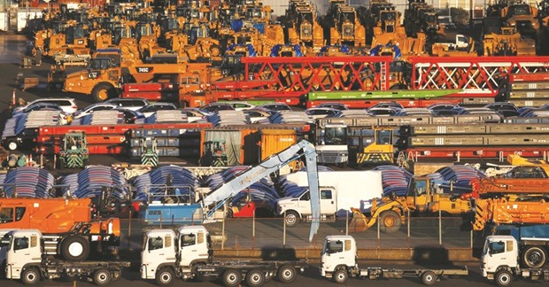 Newly manufactured vehicles await export at a port in Yokohama. Japanu2019s Ministry of Finance data showed yesterday that exports rose 5.4% year-on-year in December.