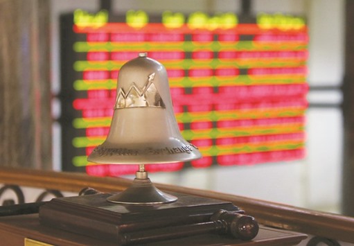 The Egyptian Exchange bell is seen at the bourse in Cairo. Egyptu2019s government is studying how and when to implement a stamp duty on stock transactions, and remains committed to a three-year delay on a capital gains tax, according to Finance Minister Amr El-Garhy.