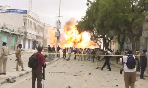 A still from a Reuters TV video shows a secondary explosion after a suspected suicide car bomb rammed into the gates of a hotel in Mogadishu yesterday.