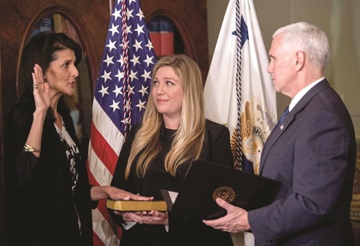 Vice President Mike Pence swears in Nikki Haley as US ambassador to the United Nations in the Vice Presidentu2019s Ceremonial Office at the Eisonhower Executive Office Building in Washington.