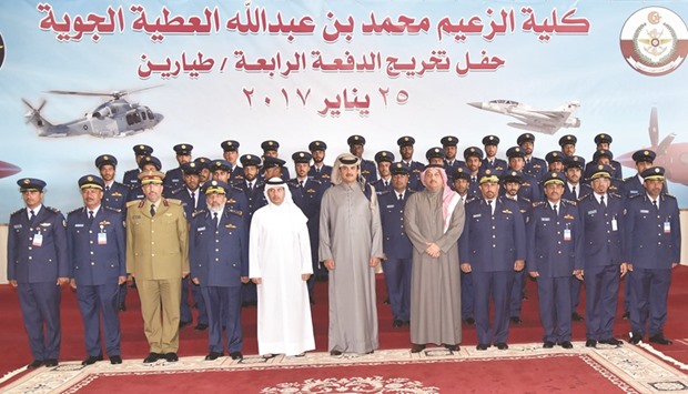HH the Emir Sheikh Tamim bin Hamad al-Thani, HE the Prime Minister and Interior Minister Sheikh Abdullah bin Nasser bin Khalifa al-Thani and other dignitaries, with the fourth batch of students of Al Zaeem Mohamed Bin Abdullah Al Atiyyah Air College.