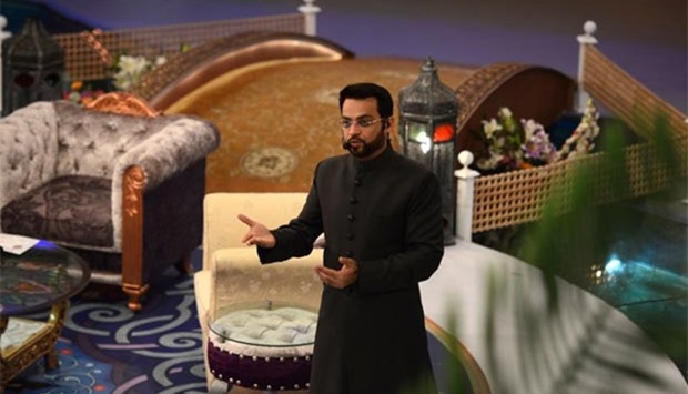 Pakistani television show host Aamir Liaqat Hussain presents an Islamic quiz show in Karachi in this file picture.