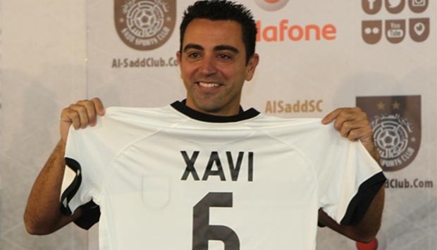 Barcelona legend Xavi Hernandez posing with his Al-Sadd shirt in this file picture.
