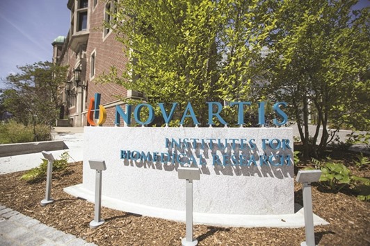 A signage is displayed in front of the Novartis Institutes for BioMedical Research building in Cambridge, Massachusetts. Novartisu2019 gradual $52bn takeover of Alcon from Swiss foodmaker Nestle was completed in 2010 as part of previous CEO and chairman Daniel Vasellau2019s empire-bulding.