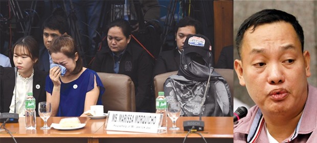 Choi Kyung-Jin (2nd L), wife of late South Korean businessman Jee Ick-Joo who was murdered allegedly by suspected policemen next to Marissa Morquicho (R), the house-help of her husband, as they appear at a Senate hearing into Jeeu2019s death in Manila.
