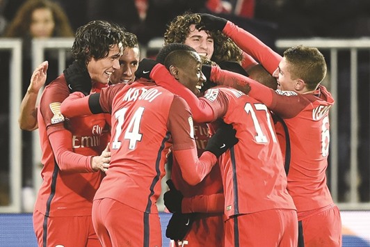 PSG players celebrate after scoring a goal during the French League Cup match against Bordeaux (FCGB) in Bordeaux. (AFP)