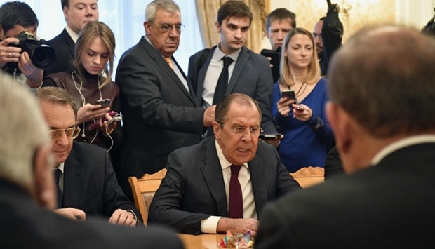 Russian Foreign Minister Sergei Lavrov (C) meets with representatives of Syria's political opposition in Moscow.