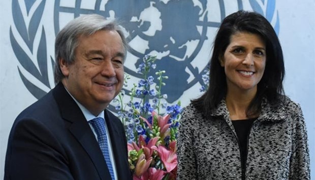 US Ambassador to the United Nations Nikki Haley is seen with UN Secretary-General Antonio Guterres at the UN headquarters in New York City on Friday.