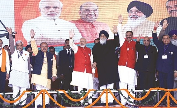 Prime Minister Narendra Modi and Punjab Chief Minister Parkash Singh Badal attend a rally ahead of Punjab Assembly elections in Jalandhar yesterday.