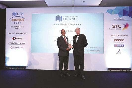 Alaga Raja, head of Doha Banku2019s Abu Dhabi Branch, receives the award in a  ceremony held in Dubai.