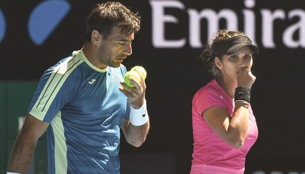File picture of Indiau2019s Sania Mirza (R) and Croatiau2019s Ivan Dodig.