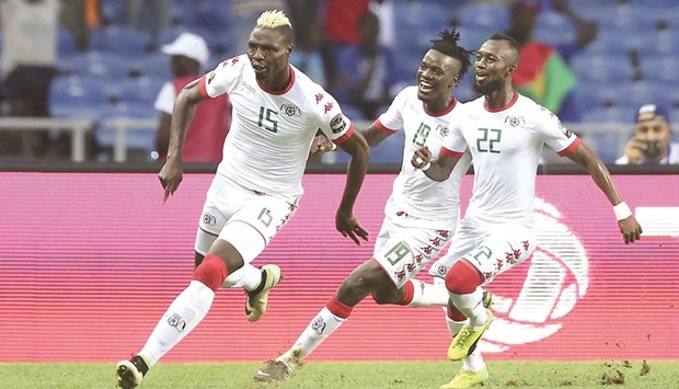 Burkina Fasou2019s Aristide Bance (left) celebrates with teammates after scoring a goal during the Africa Cup of Nations quarter-final match against Tunisia at the Stade de lu2019Amitie Sino-Gabonaise in Libreville, Gabon yesterday. (AFP)