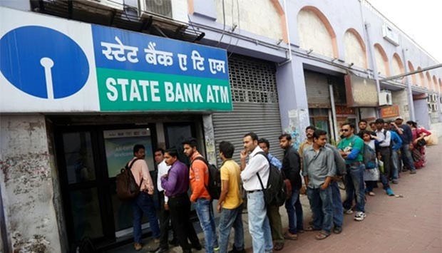 RBI's cap on cash withdrawals led to long queues outside banks and ATMs.