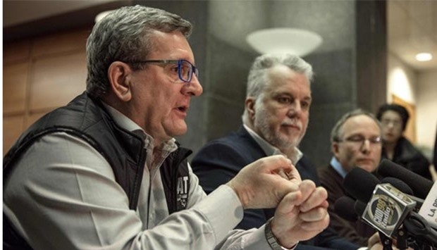 Quebec city mayor Ru00e9gis Labeaume, Quebec Prime Minister Philippe Couillard, and Minister of Public Security Martin Coiteux  hold a press conference following a shooting in a mosque at the Quu00e9bec City Islamic cultural centre on Monday.