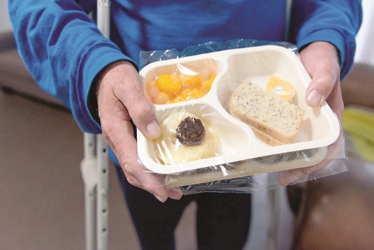 FOOD FOR THOUGHT: Food being delivered from Meals on Wheels to an osteoarthritis patient with knee problems, who says his lack of mobility makes cooking difficult.