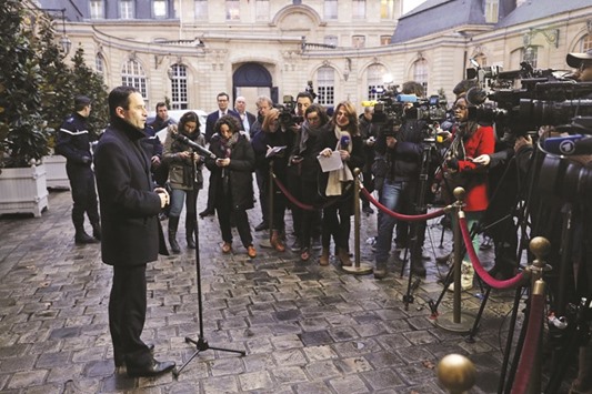 Hamon speaks to journalists after a meeting with the French prime minister at the Hotel Matignon in Paris.