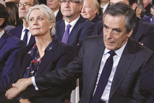 Fillon and his wife Penelope.