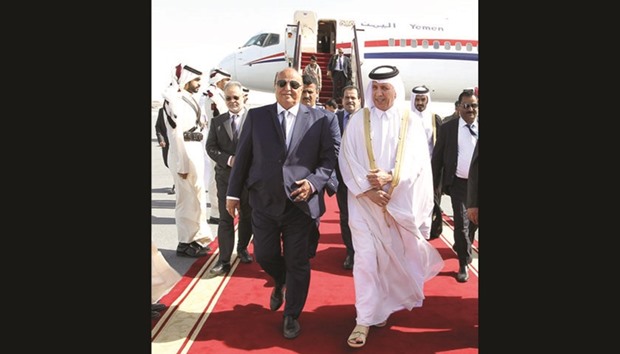 Yemenu2019s President Abd-Rabbu Mansour Hadi being welcomed by HE the Minister of State for Foreign Affairs Sultan bin Saad al-Muraikhi at Doha International Airport yesterday. He was also received by Qataru2019s ambassador to Yemen Mohamed bin Hamad al-Hajri and the Charge Du2019affaires of Yemenu2019s embassy in Qatar Mohamed Abdulla al-Zubairi.