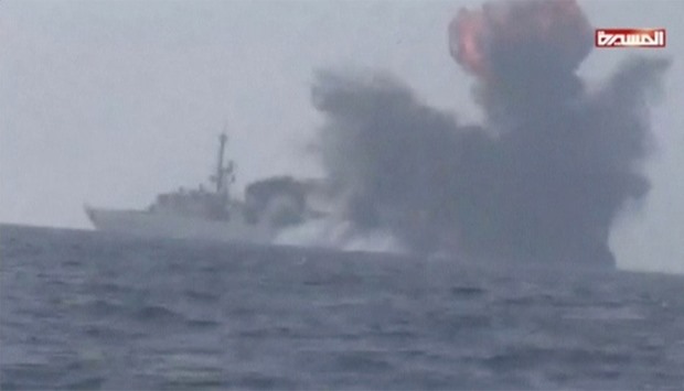An explosion is seen onboard what is believed to be a Saudi warship, off the western coast of Yemen