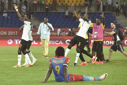 DR of Congo forward Dieumerci Mbokani watches Ghana players celebrate at the end of the 2017 Africa Cup of Nations quarter-final in Oyem, Gabon, on Sunday. The match, which Ghana won, was the last of seven matches to be played at the stadium during the competition. It is anyoneu2019s guess when the next game will be held. (AFP)