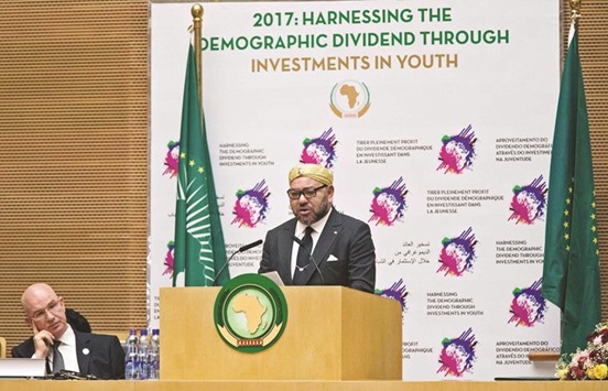 King Mohammed VI delivers a speech in the main plenary of the African Union in Addis Ababa. He took a seat at the AU headquarters yesterday for the first time in 33 years after being re-admitted by the bloc.