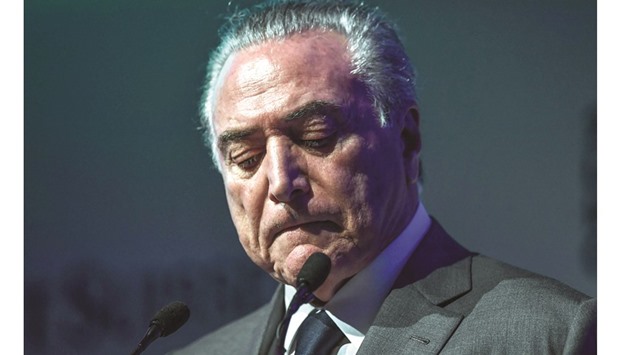 Brazilian President Michel Temer gestures during the Latin American Investment Conference in Sao Paulo, Brazil, yesterday.