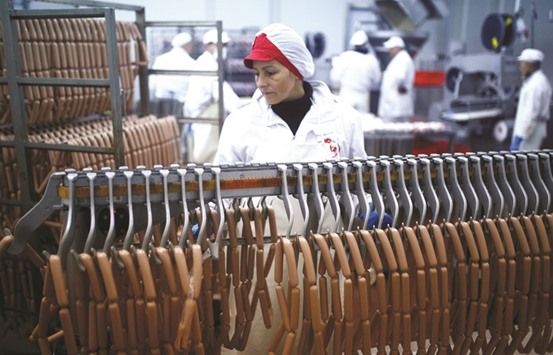 Workers at the sausages production section in Akova Impex Meat Industry Ovako, which makes halal quality certified products, in Sarajevo, Bosnia and Herzegovina on December 2, 2016. The country, half of whose population is Muslim, has become a regional hub for halal products since it set up Europeu2019s first agency for halal quality certification in 2006.