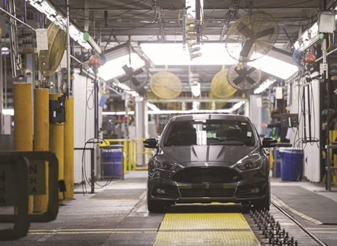 A Ford Focus vehicle seen on an assembly line at the Ford Michigan Assembly Plant in Wayne. US factory activity accelerated to a two-year high in December amid a surge in new orders and employment, suggesting some of the oil-related drag on manufacturing was fading.
