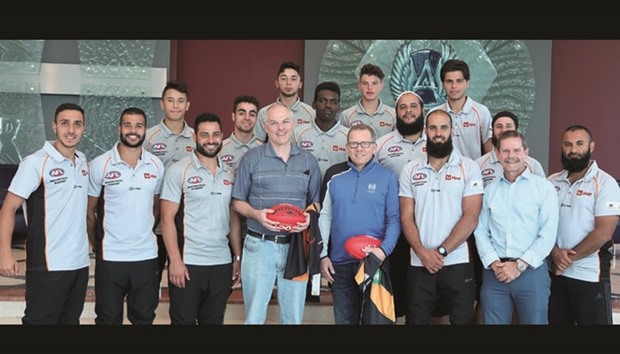 Australian ambassador to Qatar, Axel Wabenhorst (fourth from left), and Aspire Academyu2019s Director of Sports Science, Tim Cable (fifth from left), with Bachar Houli Academy athletes and coaches.
