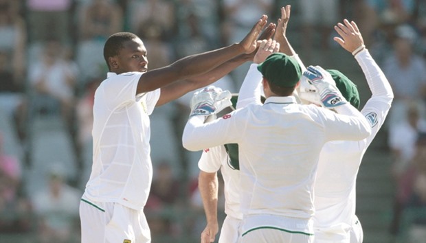 South Africau2019s Kagiso Rabada (left) celebrates a wicket on Day Three of the second Test against Sri Lanka in Cape Town yesterday.  (AFP)