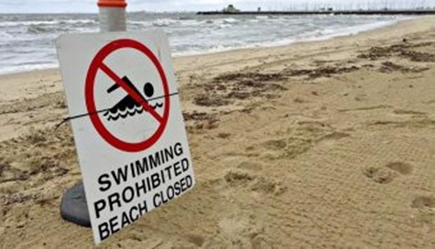 The closure sign at a Melbourne beach.