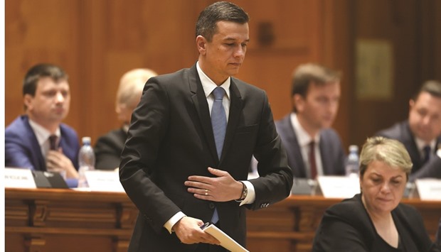 Sorin Grindeanu steps up to speak in the Romanian Parliament in Bucharest yesterday.