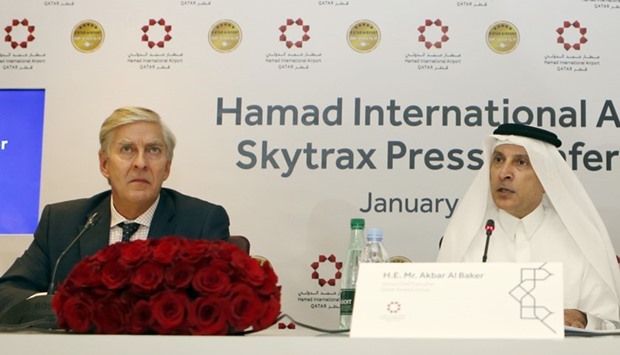 Skytrax CEO Edward Plaisted (L) and Qatar Airways chief executive Akbar al-Baker hold a press conference during a ceremony which crowned Doha's Hamad International as a ,five-star, airport, one of only six in the world