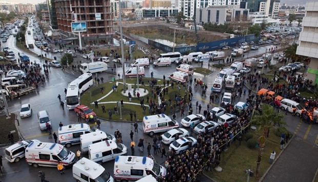 Ambulances arrive at the scene after an explosion outside a courthouse in Izmir, Turkey. Reuters