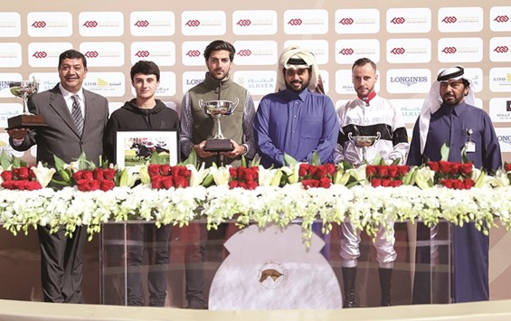Ahmed Kobeissi-trained Footprintinthesand edged out Alban de Mieulleu2019s Marjan in a thrilling duel to win the Al Jassasiya Cup, a Local Thoroughbreds Open Handicap event, at the Qatar Racing and Equestrian Club yesterday.