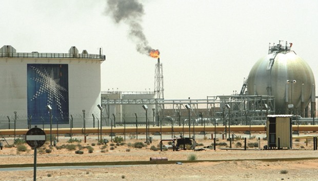A gas flame is seen in the desert near the Khurais oilfield, Saudi Arabia (file). State-owned Saudi Arabian Oil Co, known as Saudi Aramco, has increased its official pricing for Arab Light crude to Asia by 60 cents a barrel to 15 cents below the regional benchmark.