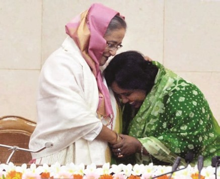 Mayor Selina Hayat Ivy embracing Prime Minister Sheikh Hasina at the PMu2019s office in Dhaka after being administered oath of office yesterday.